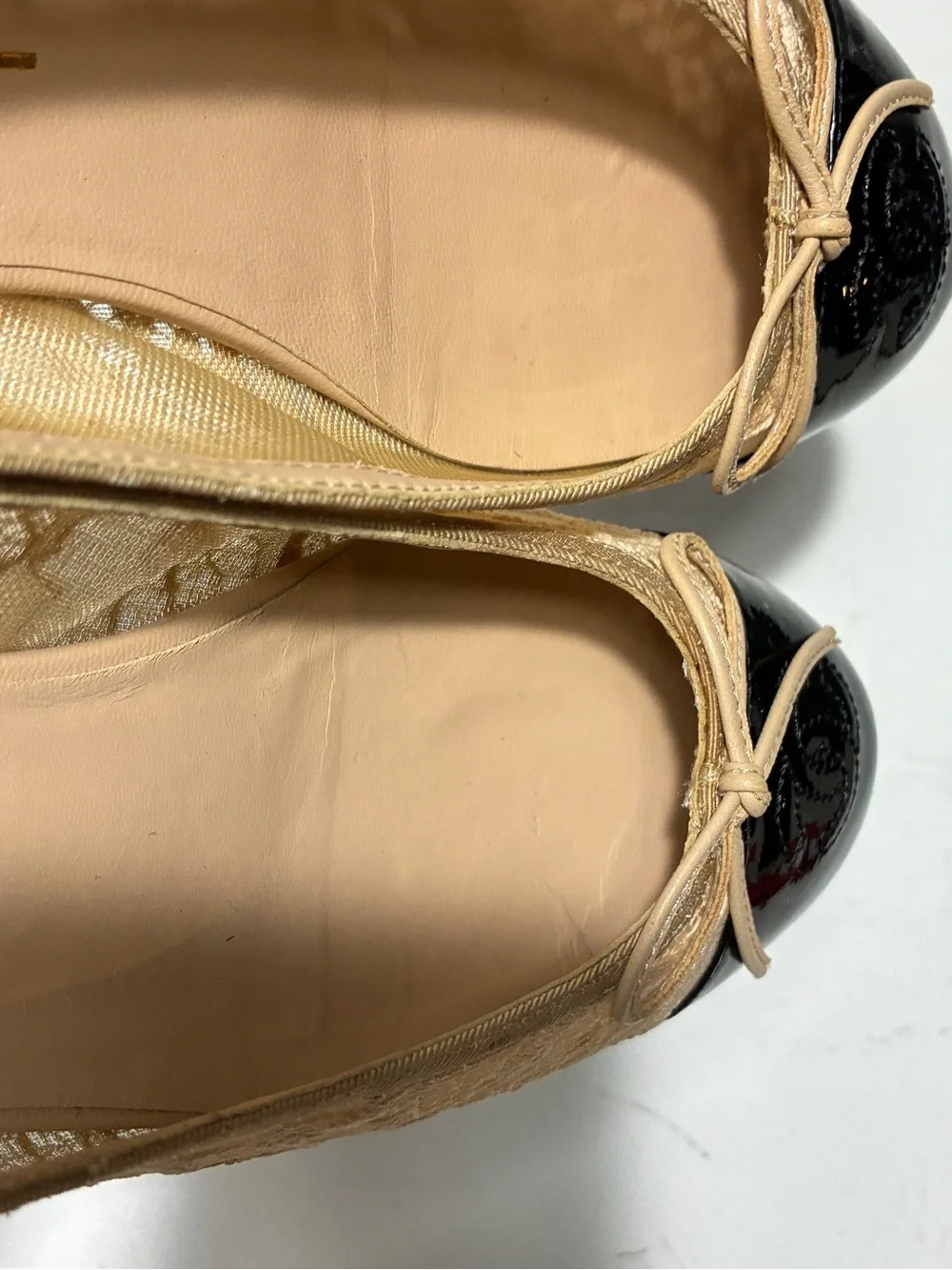 CHANEL Beige Lace Ballet Flats with Black Patent Cap Toe and Bow